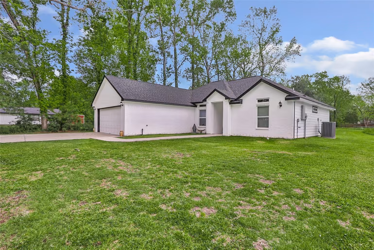 Photo 3 of 451 County Road 2358, Hardin, TX