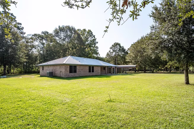 Photo 2 of 27 County Road 3371, Cleveland, TX