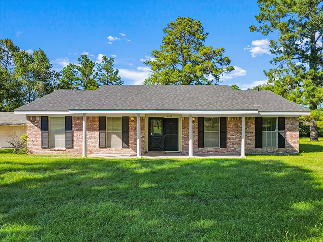Photo of 4016 State Highway 30 W, Huntsville, TX 77340