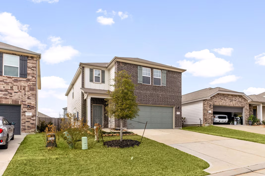 Photo 2 of 718 Amesbury Road, Conroe, TX