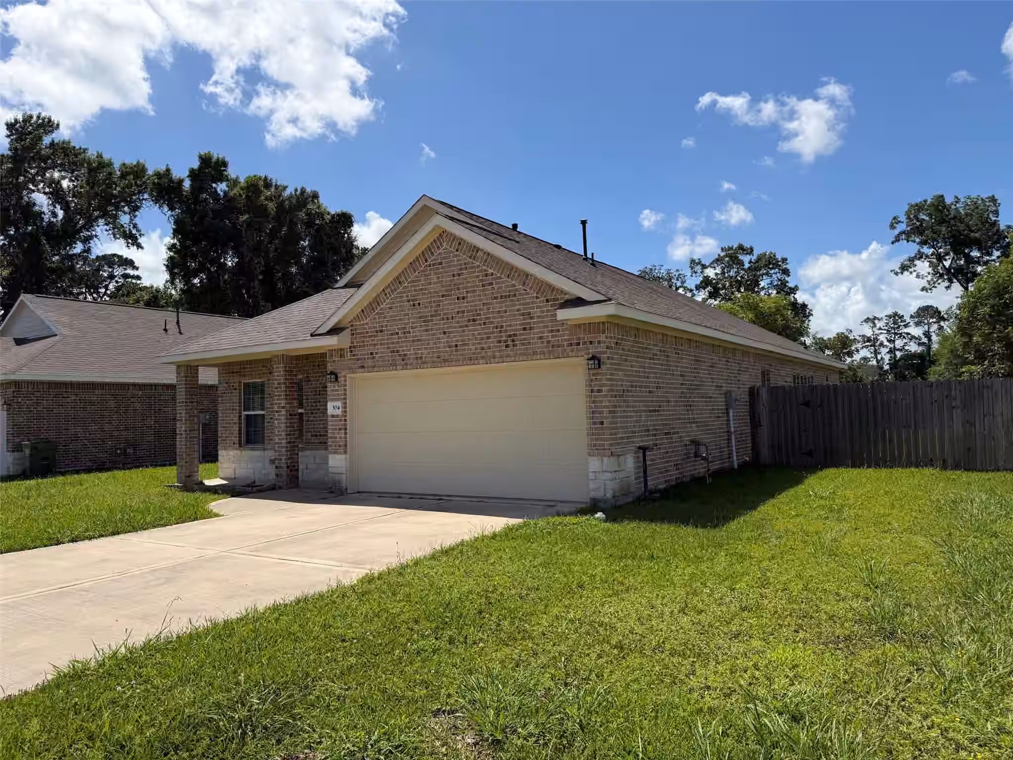 Photo 2 of 304 Carlos Leal Drive, Dayton, TX