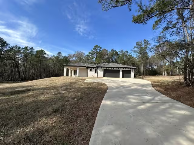 Photo of 875 Lonestar Road, Huntsville, TX 77340