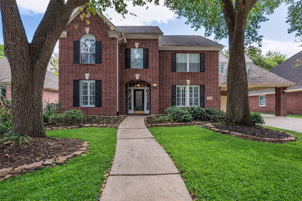Photo 2 of 15614 Mustang Creek Circle, Cypress, TX
