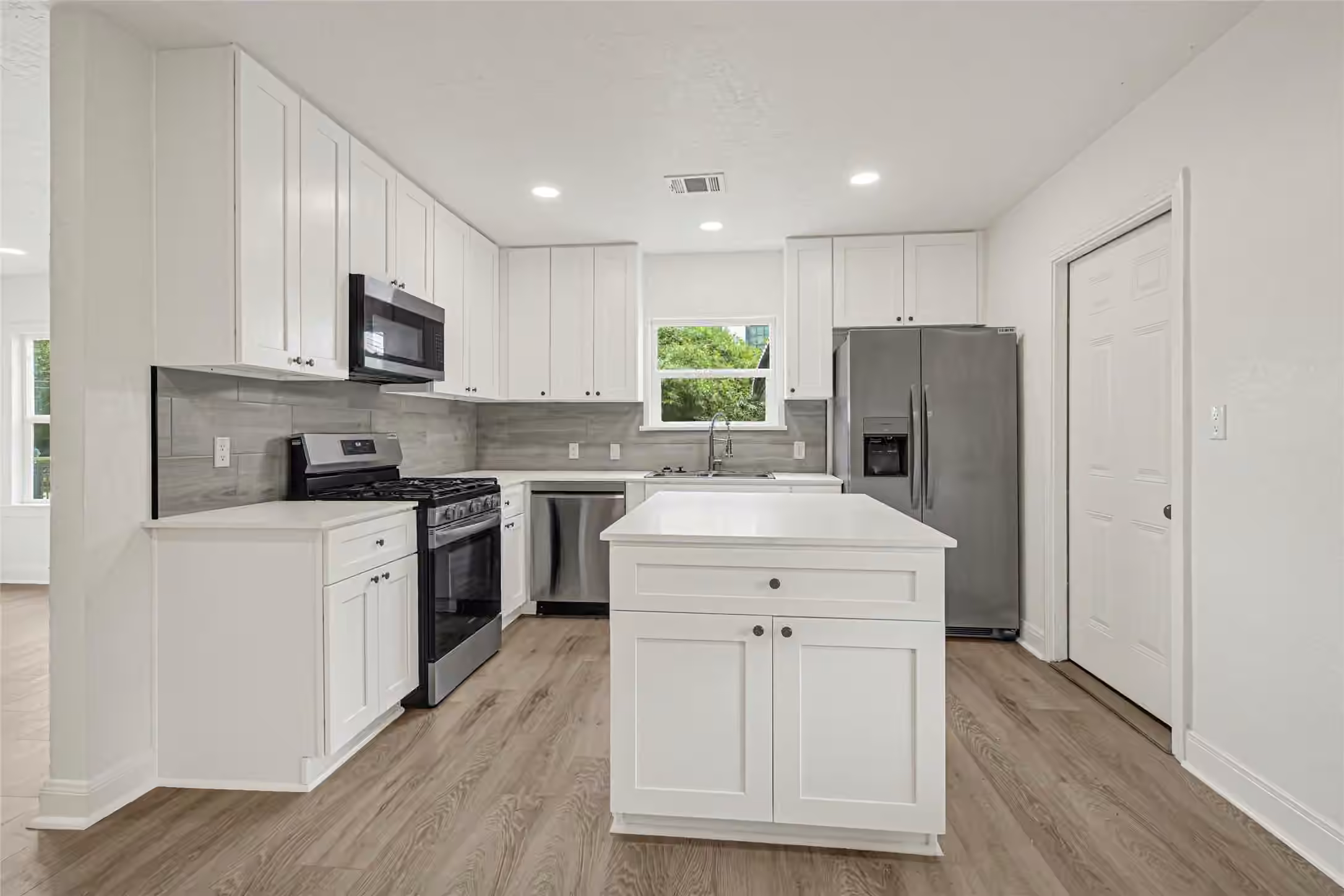 Photo 2 of 1202 N Roberson Street, Conroe, TX