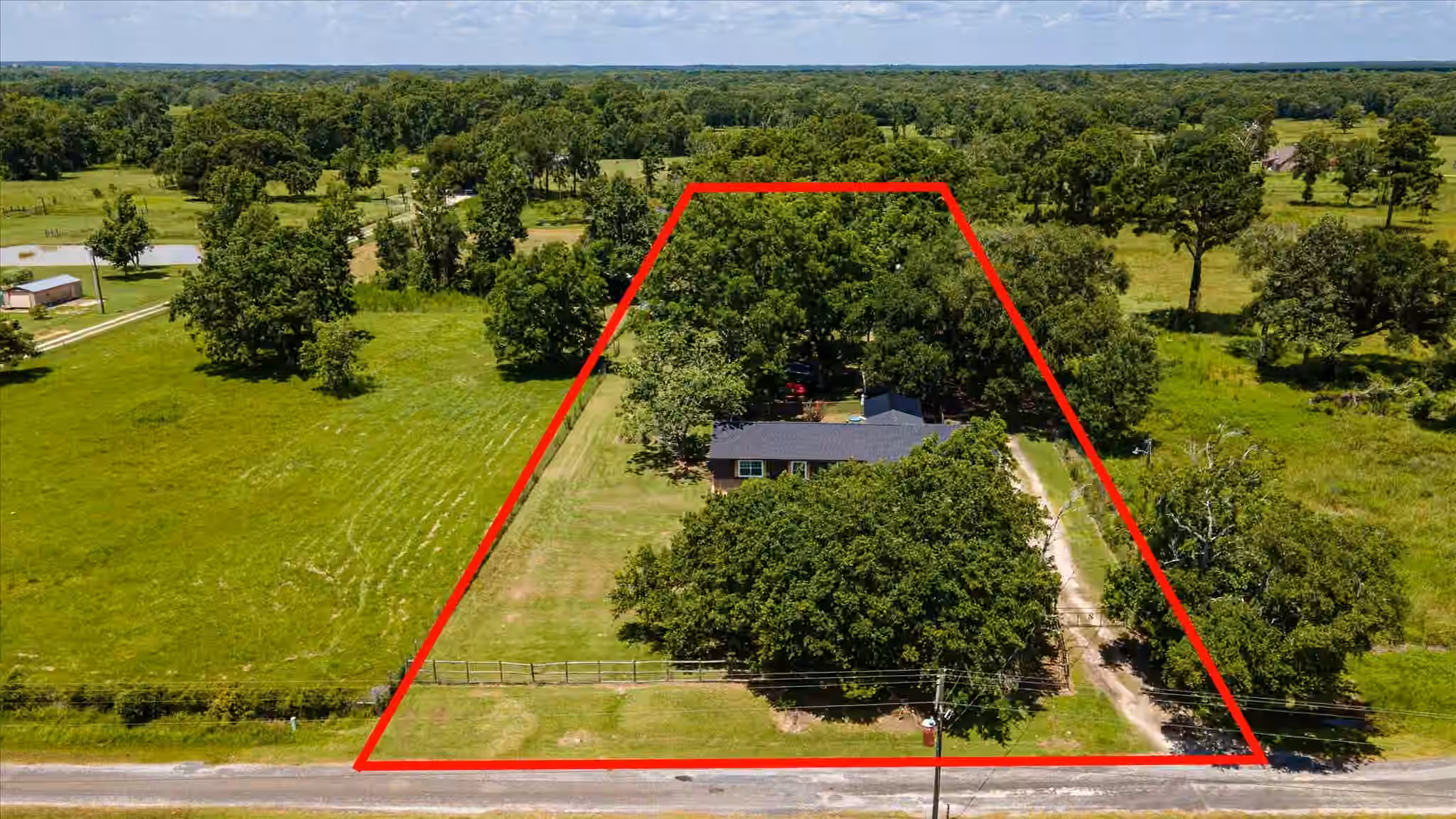 Photo 3 of 384 County Road 2046, Hull, TX