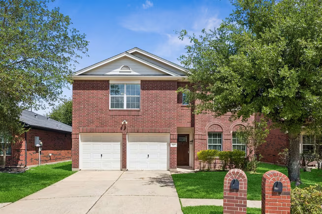 Photo 2 of 527 Cypresswood Knoll, Spring, TX