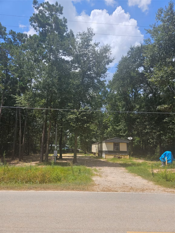 Photo 2 of 25515 Cambridge Boulevard, New Caney, TX
