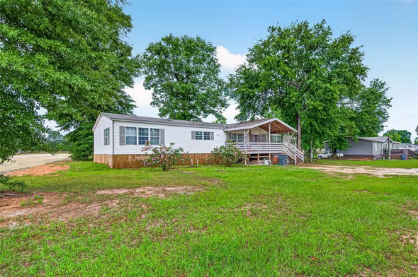 Photo 2 of 5982 Waukegan Rd, Conroe, TX