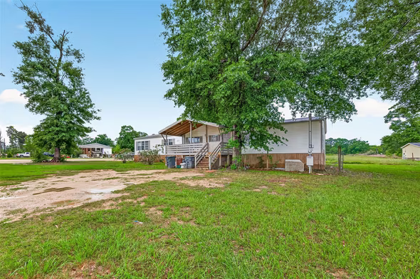 Photo 3 of 5982 Waukegan Rd, Conroe, TX