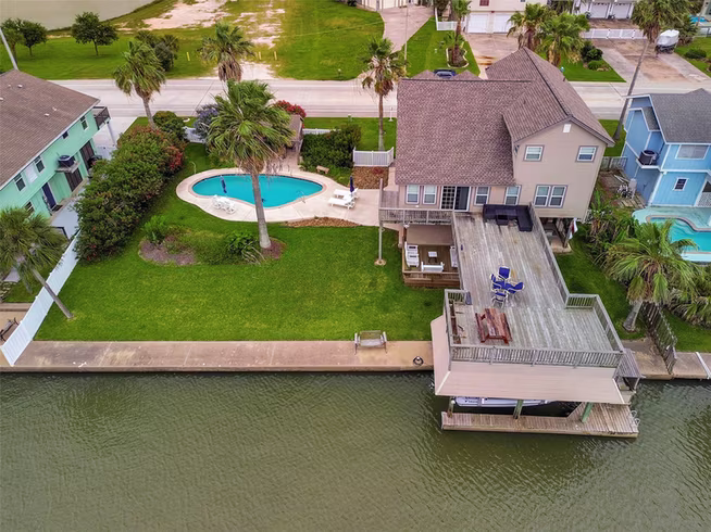 Photo of 1302 Tiki Drive, Tiki Island, TX 77554